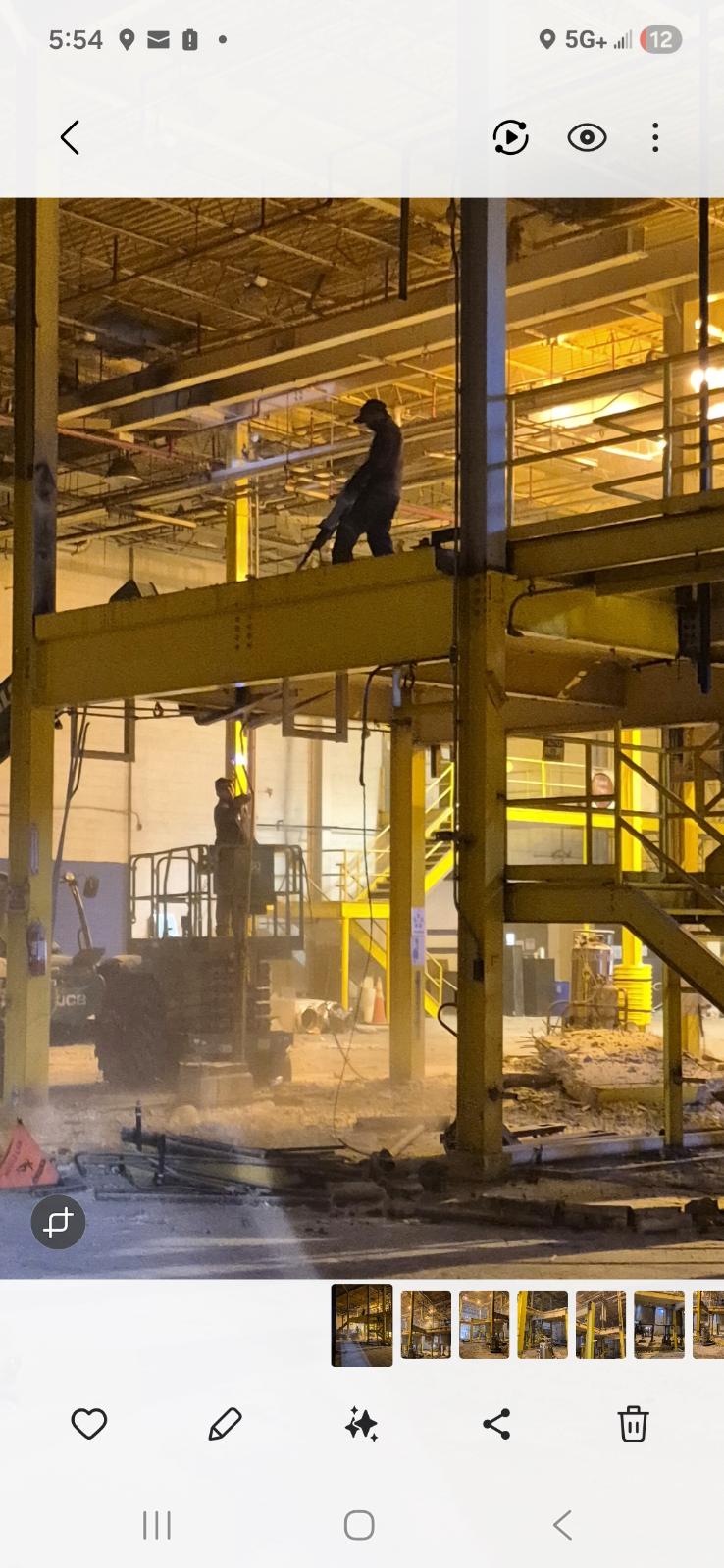 Industrial jobsite with crew performing interior demolition