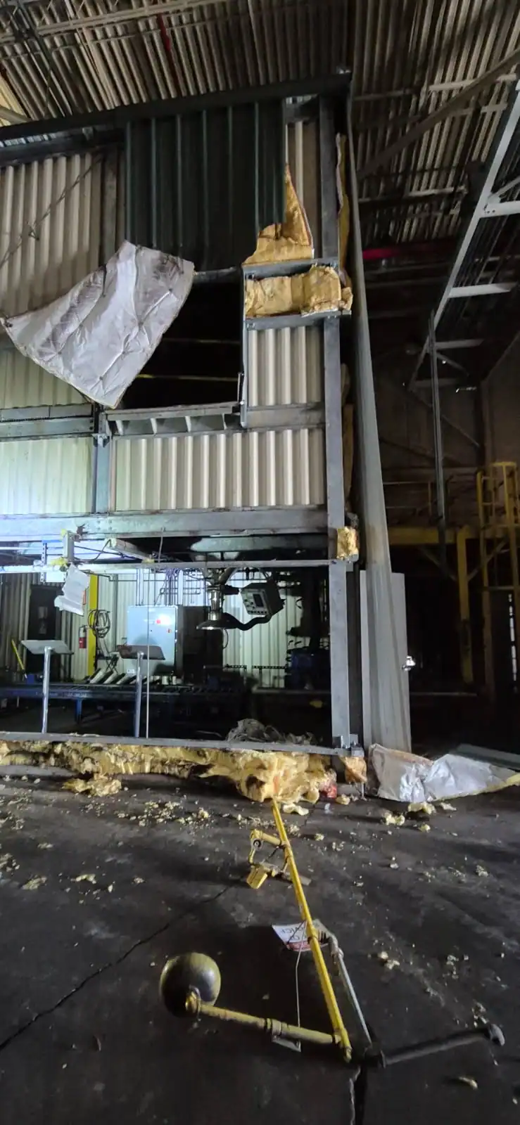 Crew performing interior demolition inside commercial building